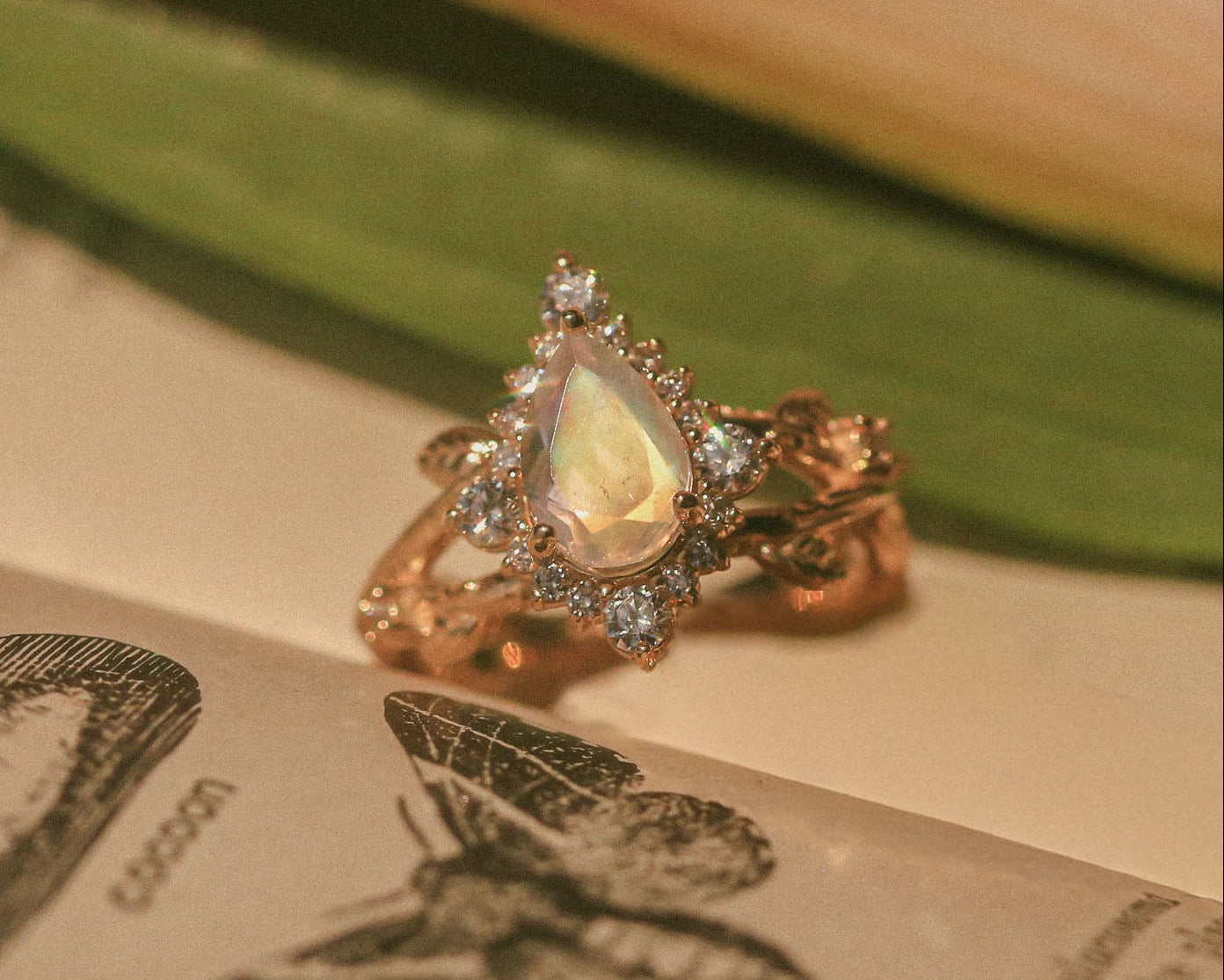 "Artemis On The Vine Divine" - Moonstone Engagement Ring With Diamond Accents & A Branch-Style Band