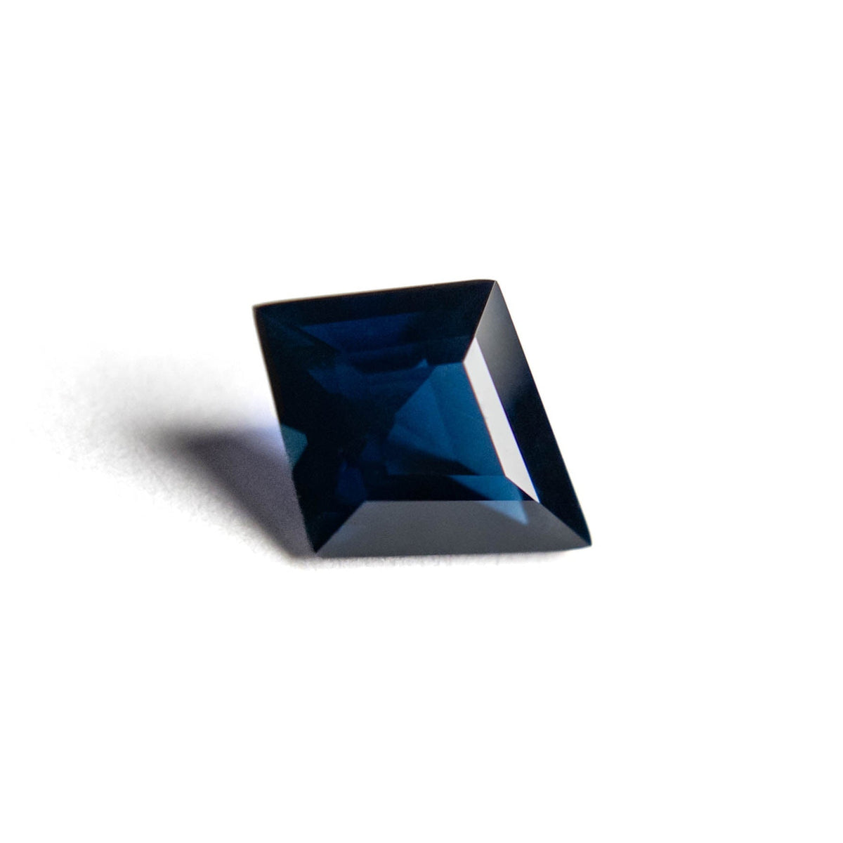 1.56 Carat Deep Blue Step Cut Kite Tanzanian Sapphire