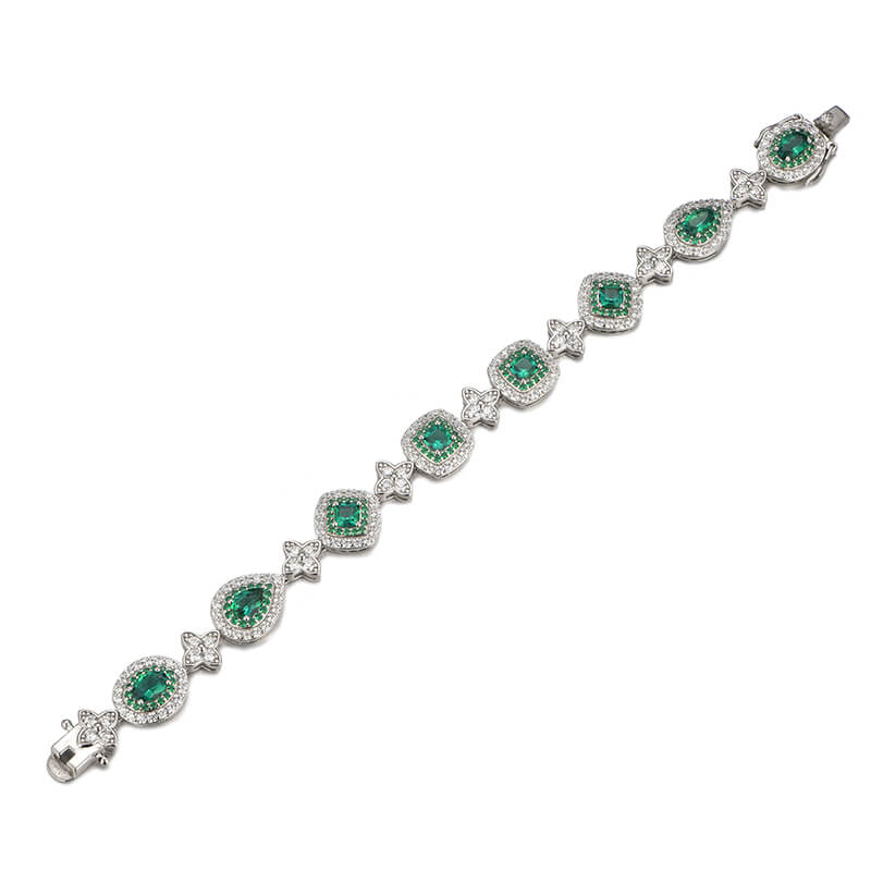 Alternating Halo Emerald And Four Leaf Bracelet In Sterling Silver