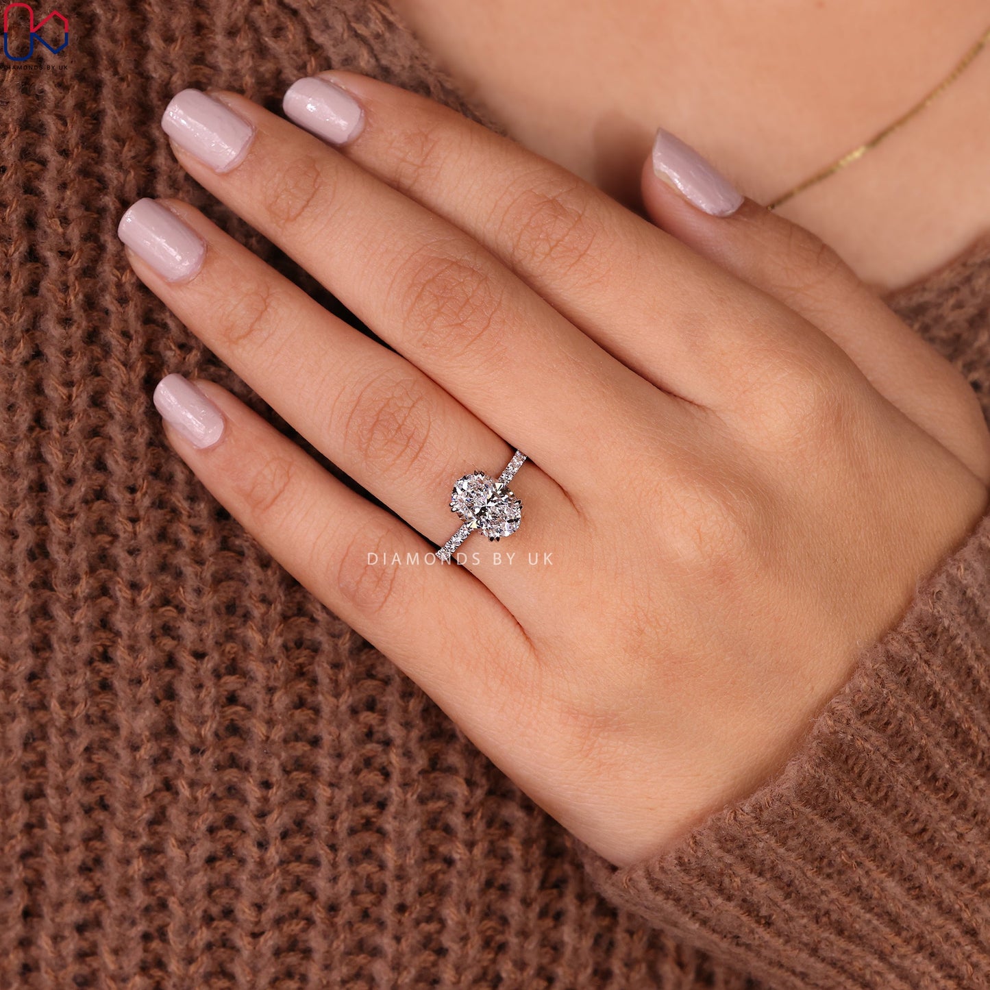 Oval Cut Diamond Ring In Pave Setting
