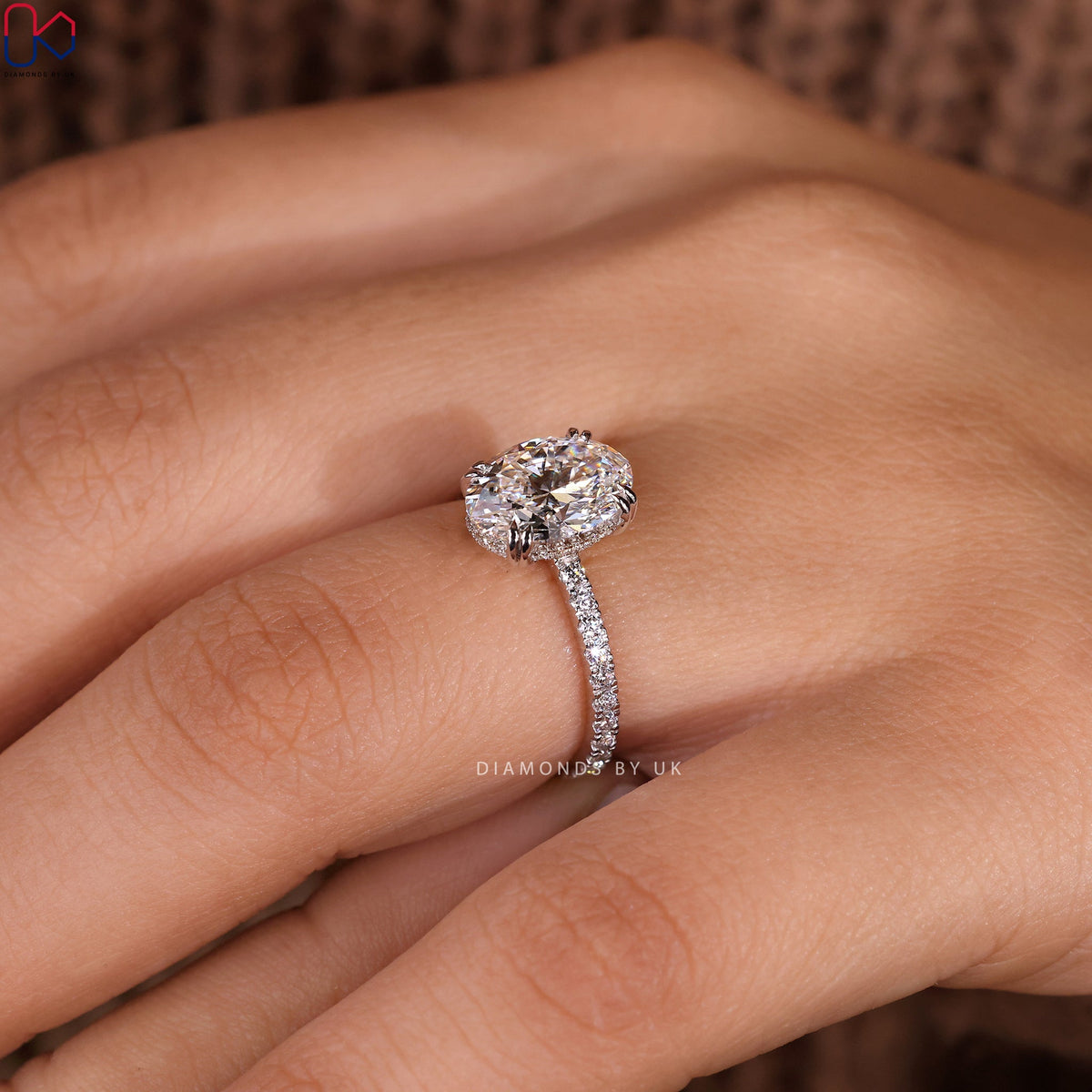 Oval Cut Diamond Ring In Pave Setting