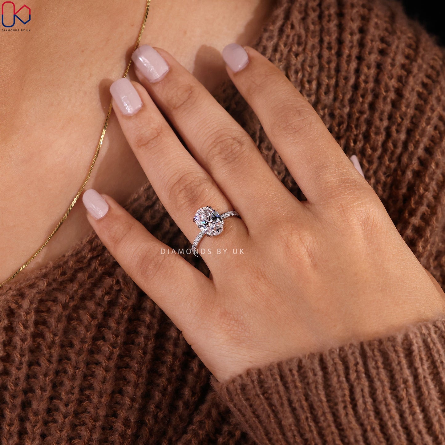 Oval Cut Diamond Ring In Pave Setting