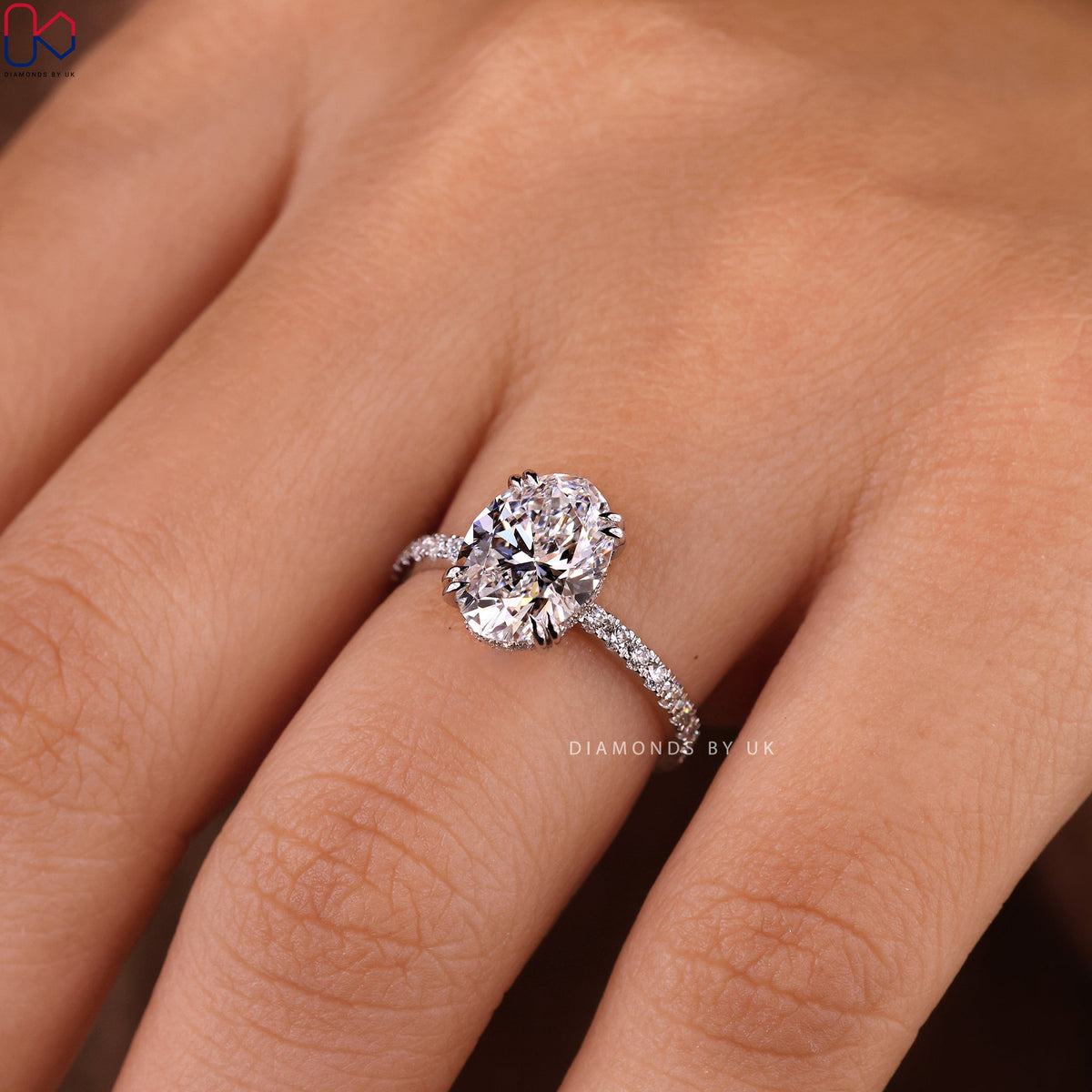 Oval Cut Diamond Ring In Pave Setting