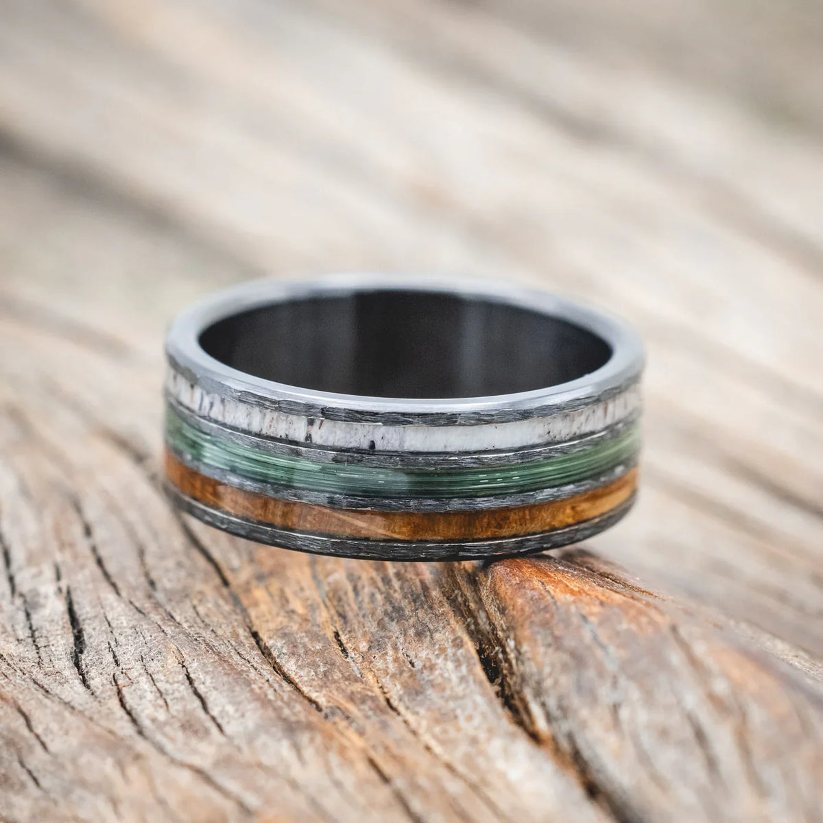 "Rio" - Antler, Green Mono Fishing Line, And Whiskey Barrel Oak Wedding Band With A Hammered Finish - Black Zirconium (8mm) - Size 10 1/2