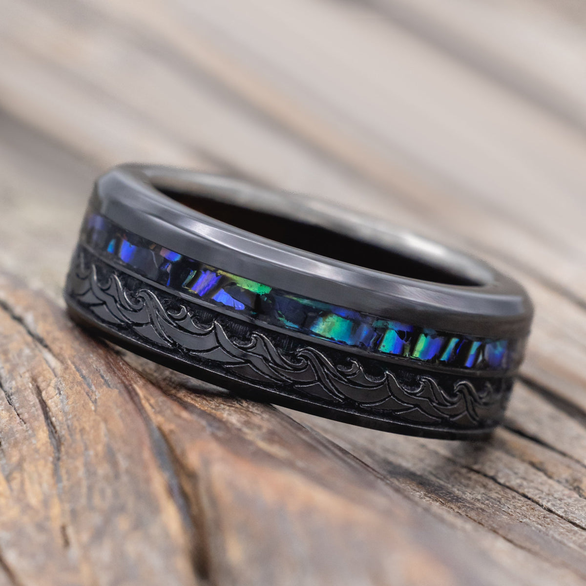 "Triton" - Wave Engraved Wedding Band With Paua Shell Inlay & Koa Wood Lining - Black Zirconium (8mm) - Size 10 1/2