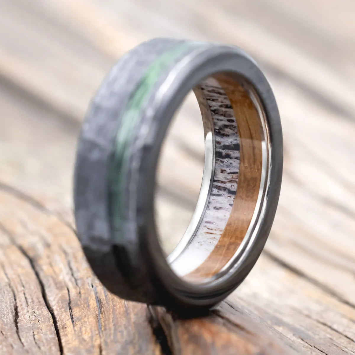 "Vertigo" - Green Mono Fishing Line Inlay Wedding Ring Featuring An Antler & Whiskey Barrel Lining With Hammered Finish - Black Zirconium (8mm) - Size 10 3/4