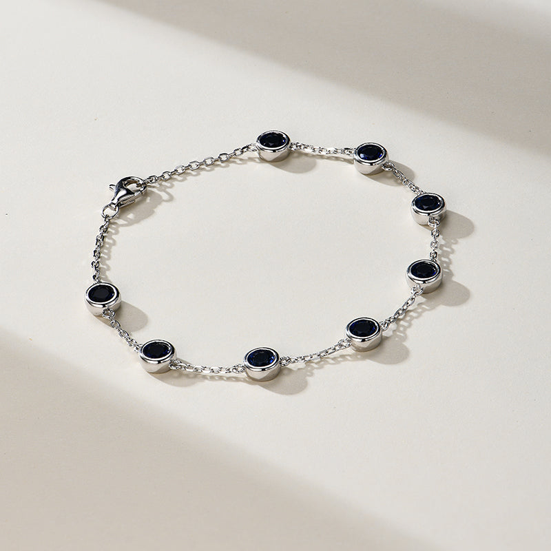 Bezel Set Round Gemstones Evenly Spaced Bracelet In Sterling Silver