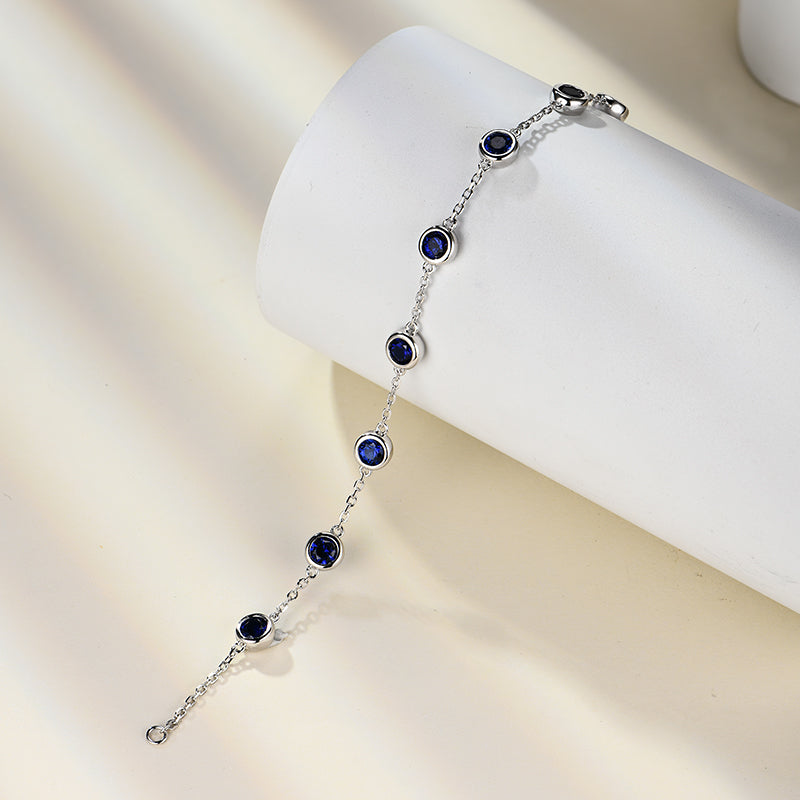 Bezel Set Round Gemstones Evenly Spaced Bracelet In Sterling Silver