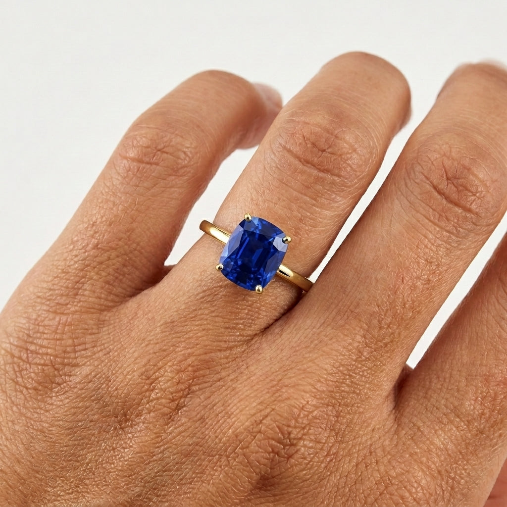 Prong-Set Cushion Blue Sapphire Solitaire Ring