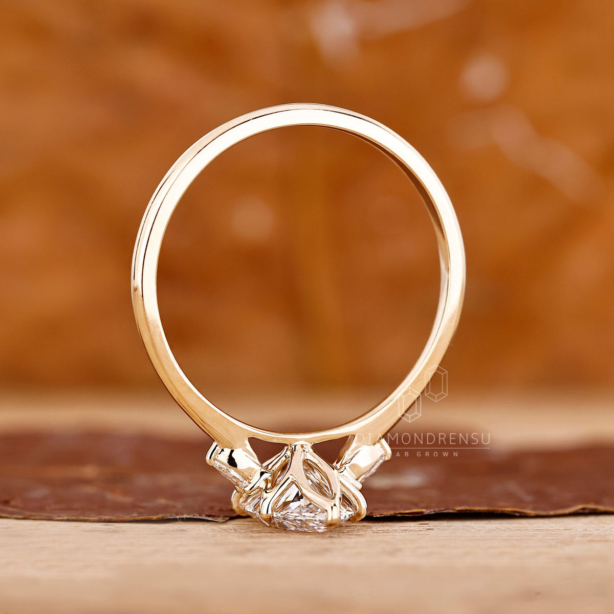 Marquise and Pear Cut Three Stone Engagement Ring