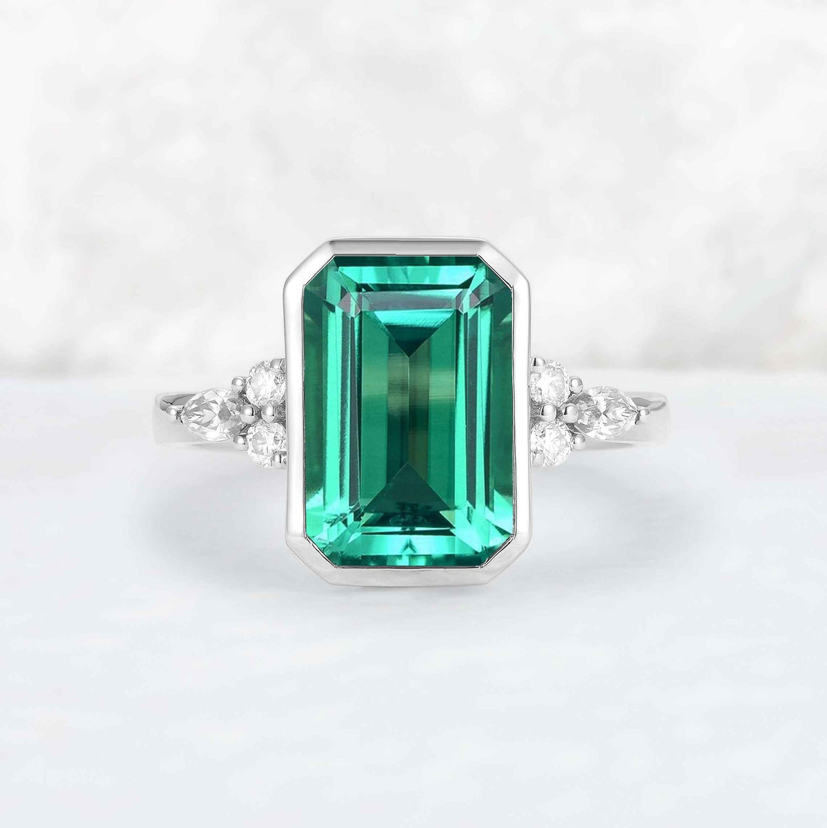 Cluster 3 Carat Emerald Cut Emerald Bezel Ring