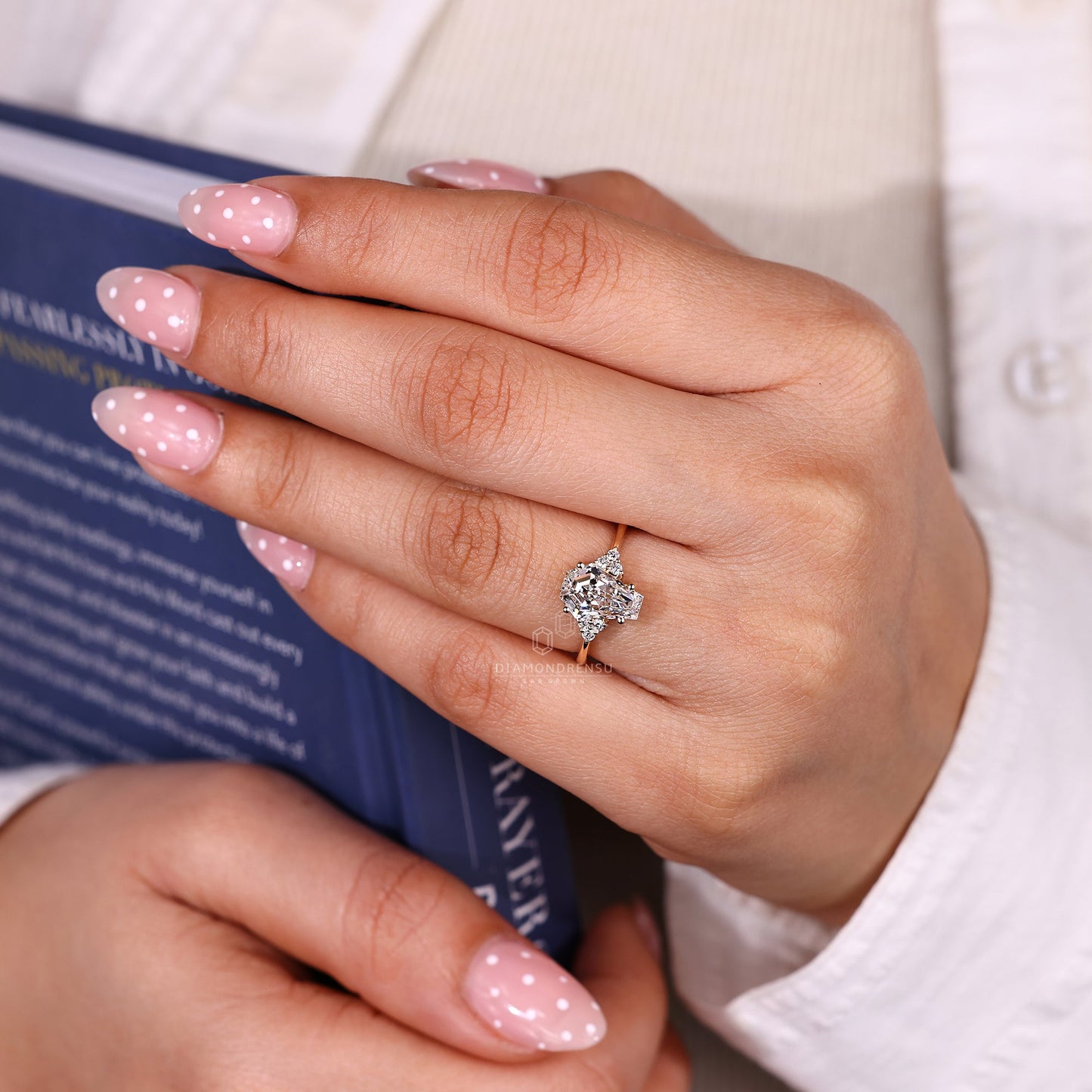 Coffin Cut Diamond Ring with Round Side Stones and Muse Setting