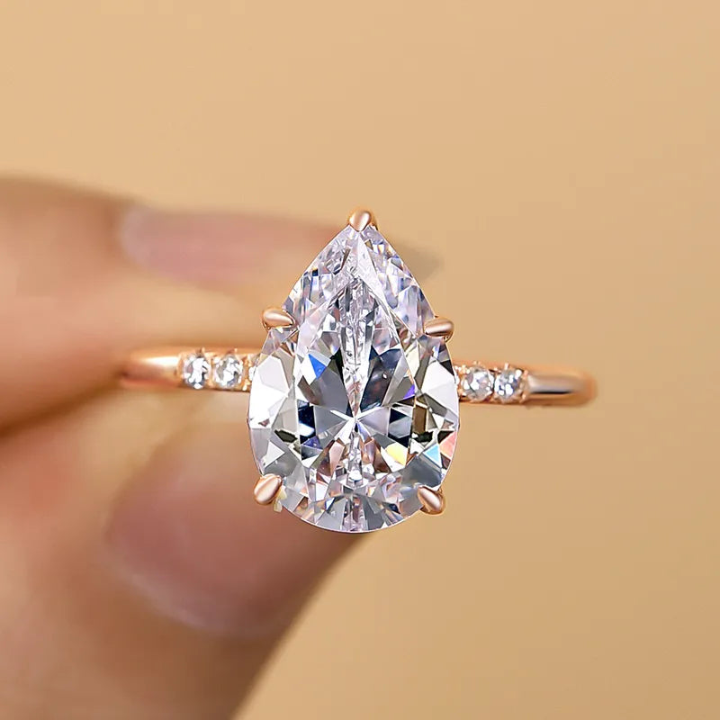 Ornate Pear Cut 3.5ct Side Stone Engagement Ring In Sterling Silver