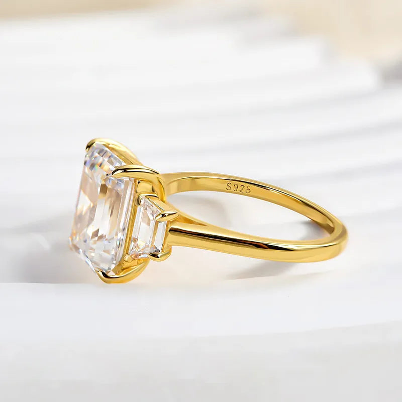 Lavish Emerald Cut 4.0ct Three Stone Engagement Ring In Sterling Silver