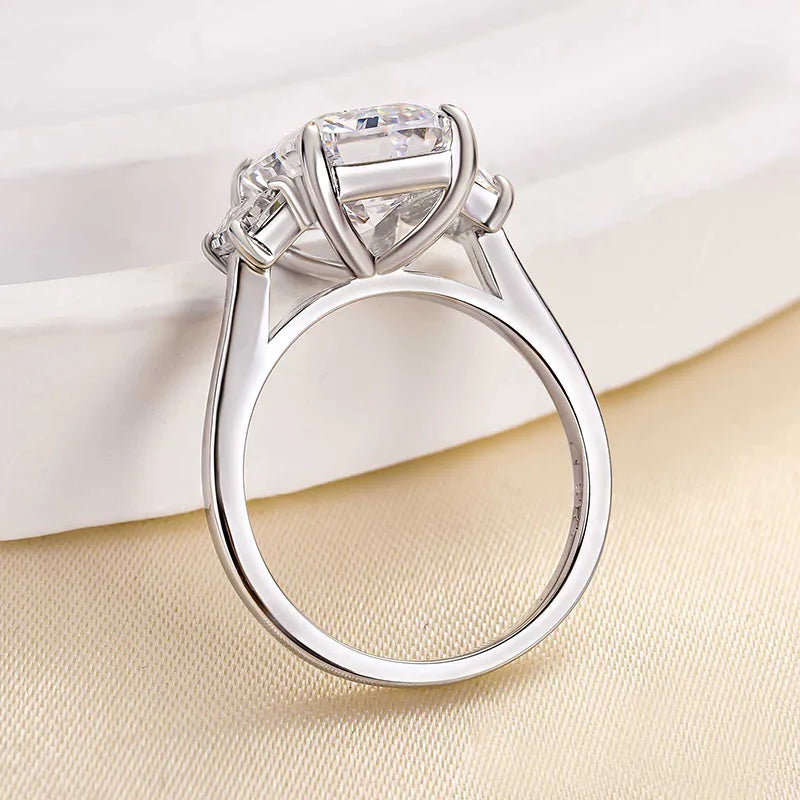 Lavish Emerald Cut 4.0ct Three Stone Engagement Ring In Sterling Silver
