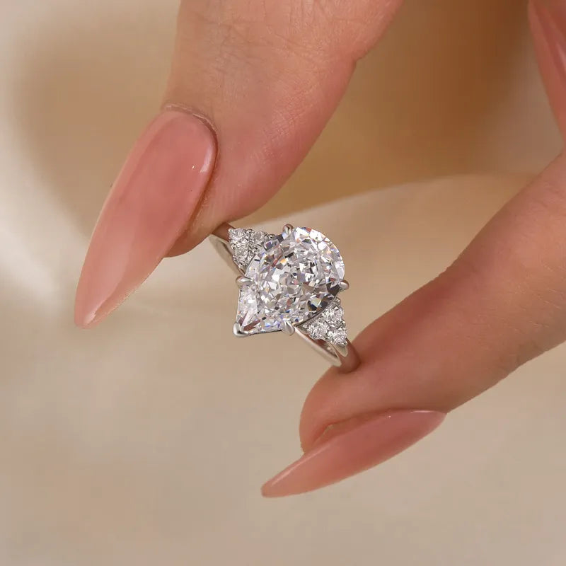 Stunning Pear Cut 3.0ct Side Stone Engagement Ring In Sterling Silver