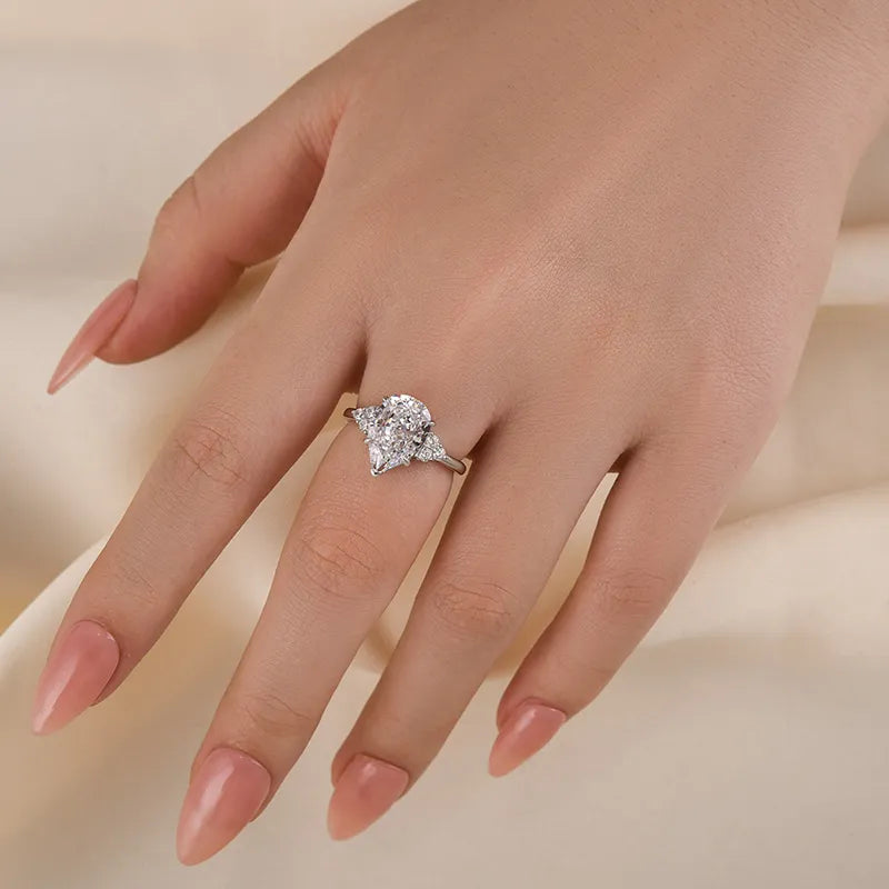 Stunning Pear Cut 3.0ct Side Stone Engagement Ring In Sterling Silver