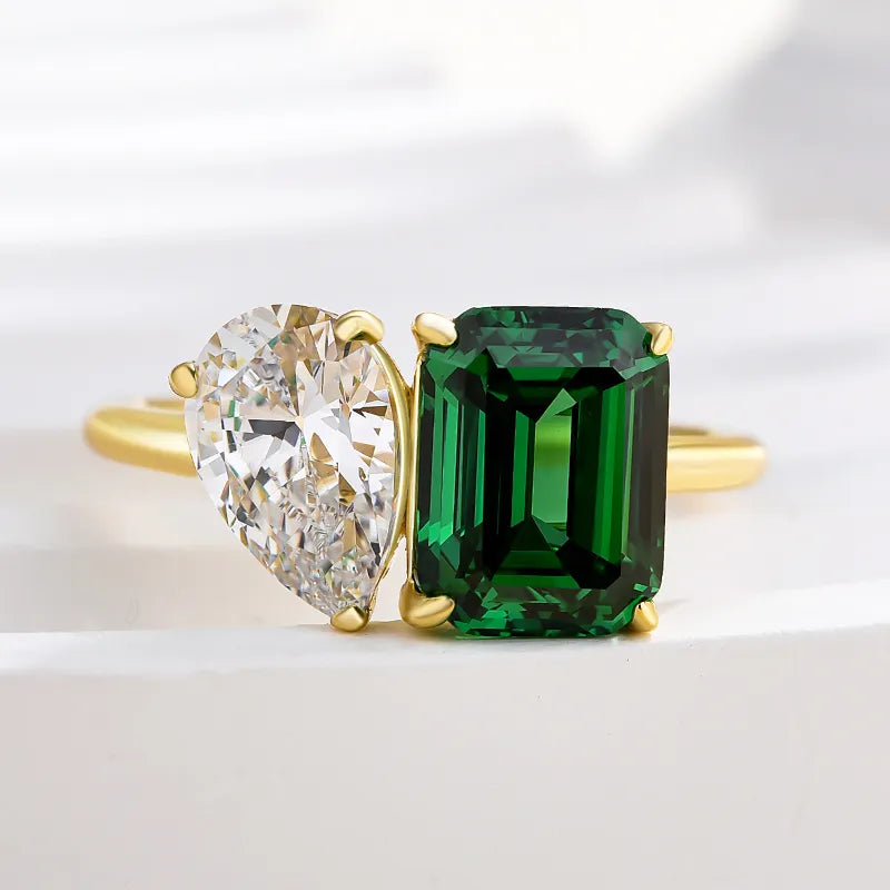 Regal Emerald Cut 2.5ct & Pear Cut 1.8ct Engagement Ring In Sterling Silver