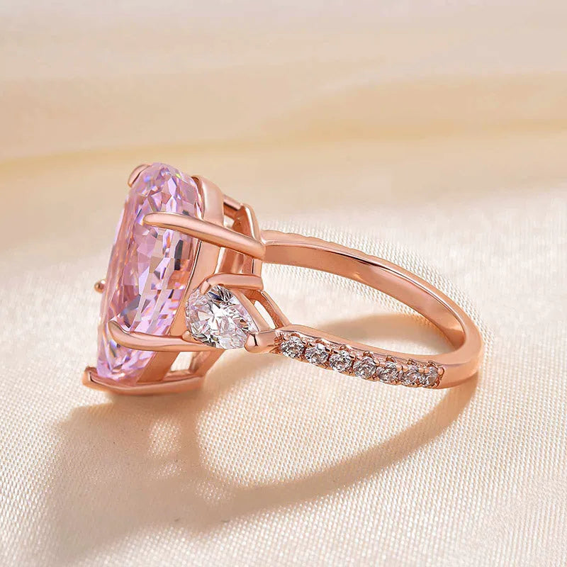 Majestic Pear Cut 4.0ct Pink Stone Three Stone Engagement Ring In Sterling Silver