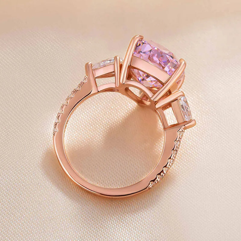 Majestic Pear Cut 4.0ct Pink Stone Three Stone Engagement Ring In Sterling Silver
