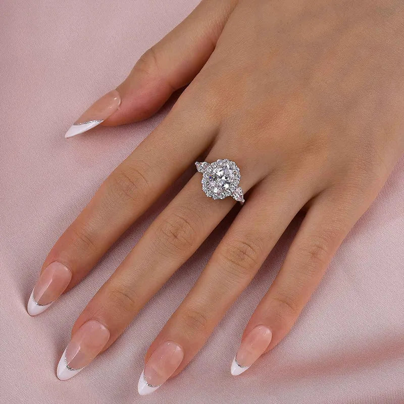 Artful Oval Cut 2.5ct Three Stone Engagement Ring In Sterling Silver