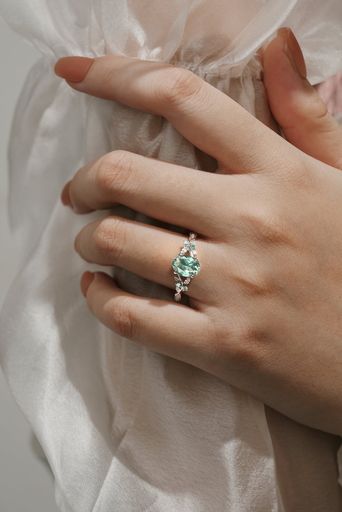 Oval Cut Lab Green Sapphire Engagement Ring With Leaf