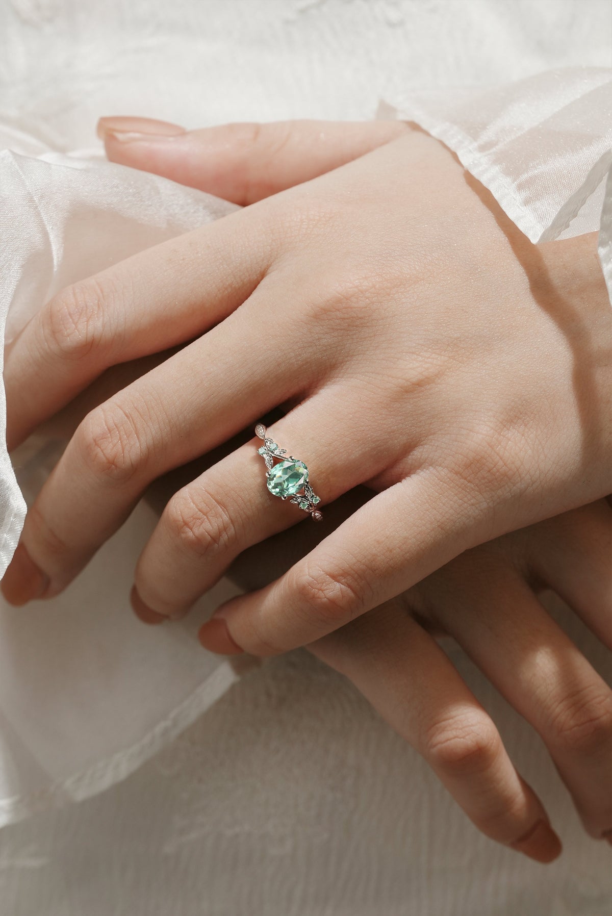 Oval Cut Lab Green Sapphire Engagement Ring With Leaf
