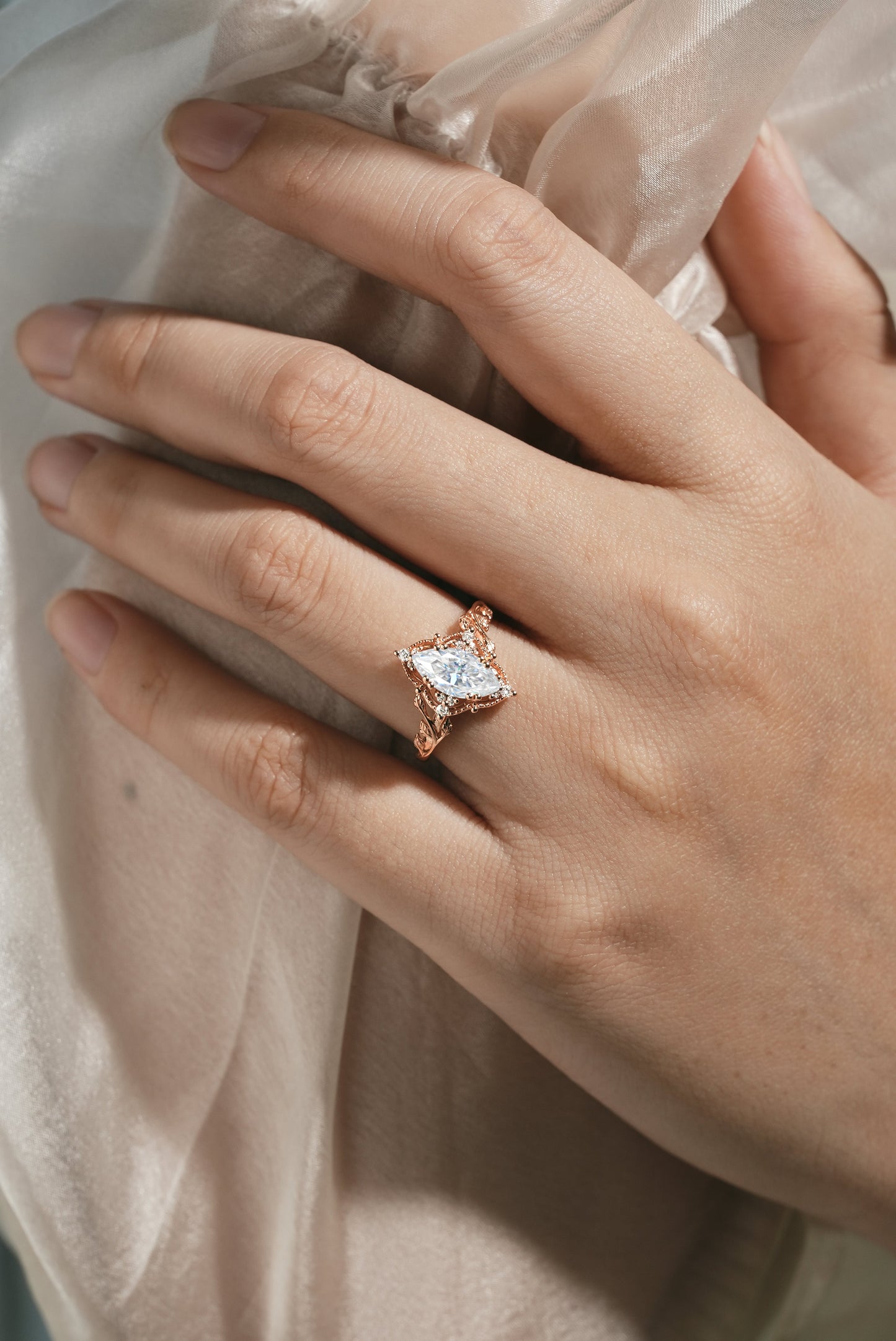 Marquise Cut Moissanite Ring with Leaf Design