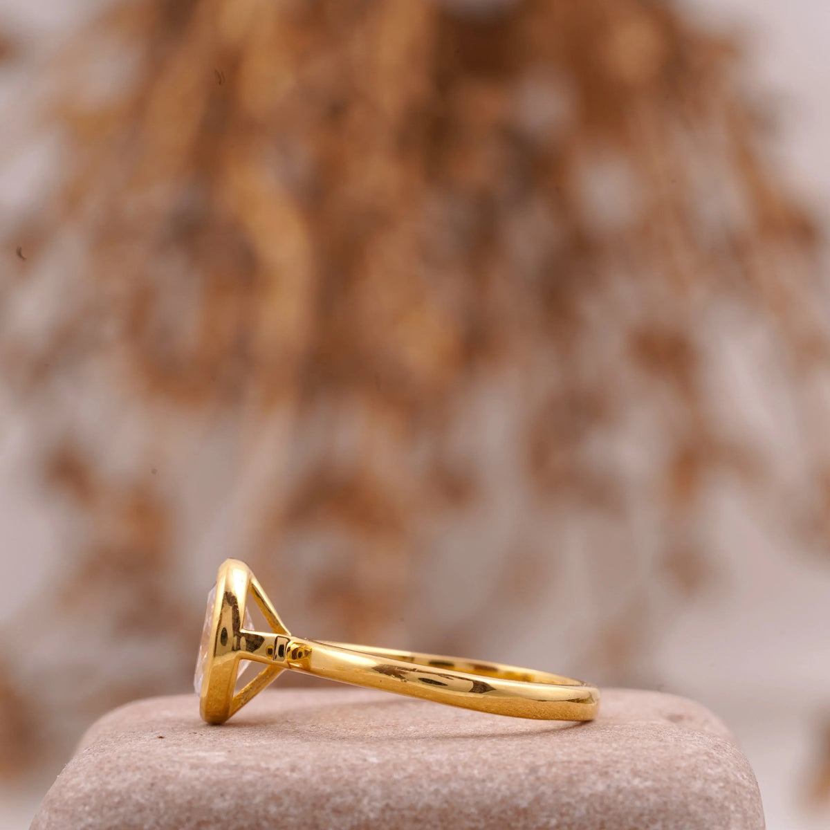 Oval Cut Bezel Set Engagement Ring