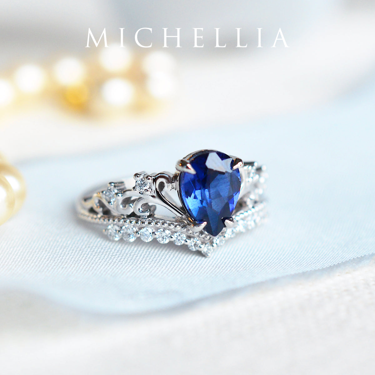 [Francesca] Heirloom Crown Pear Engagement Ring in Blue Sapphire