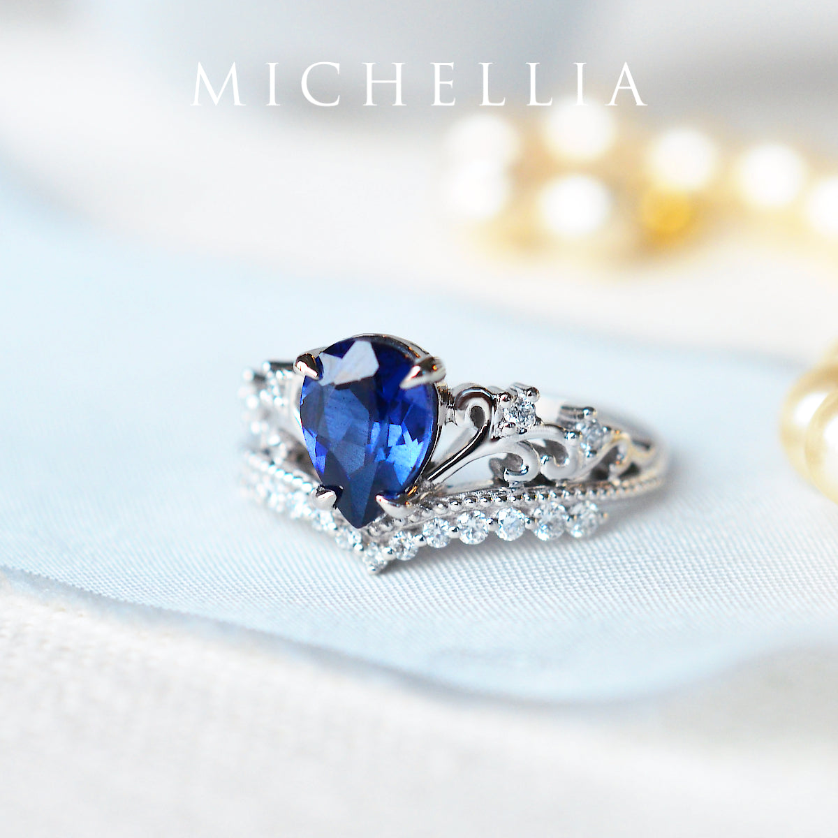 [Francesca] Heirloom Crown Pear Engagement Ring in Blue Sapphire