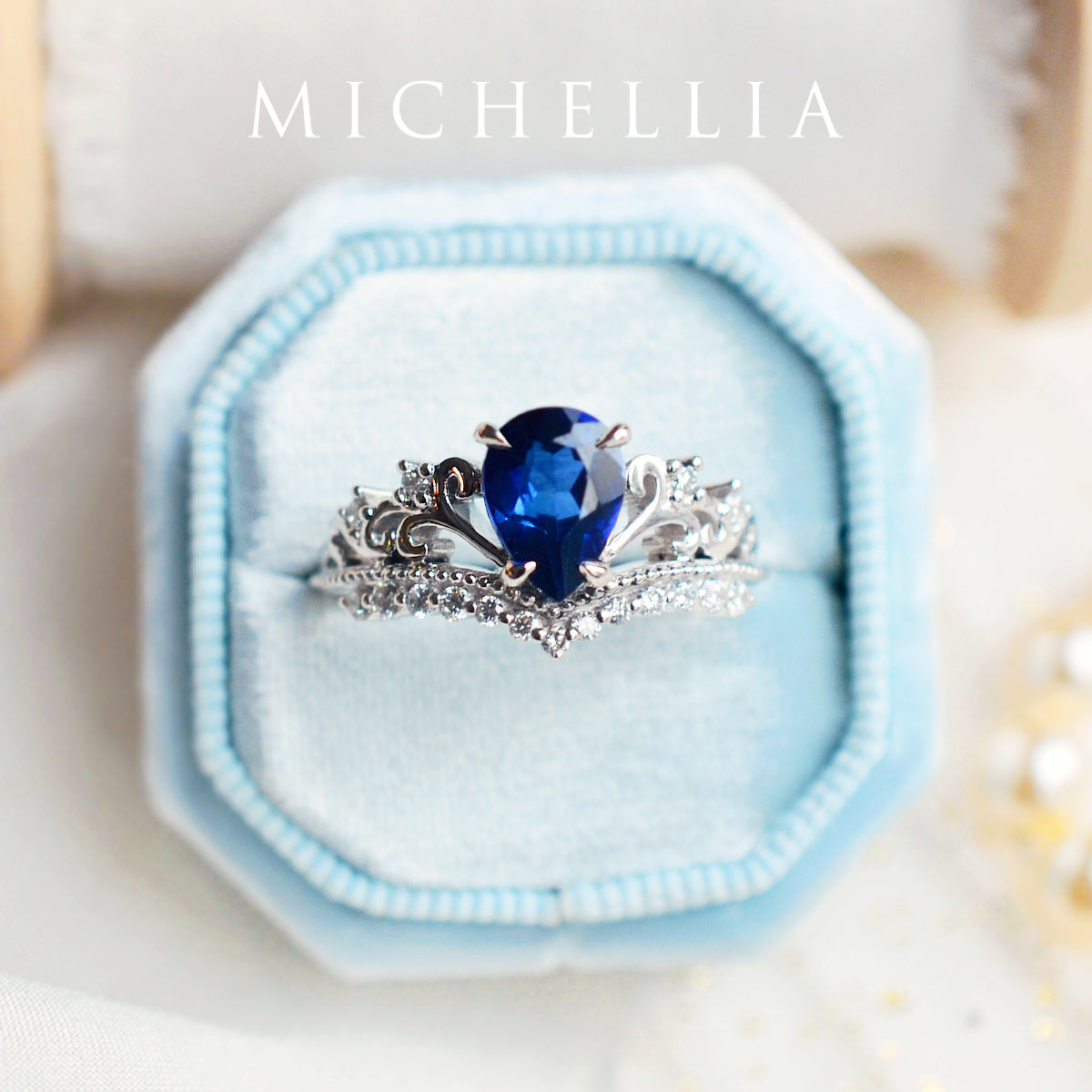 [Francesca] Heirloom Crown Pear Engagement Ring in Blue Sapphire