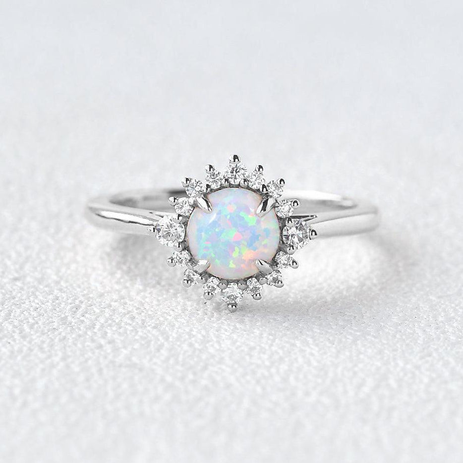 Valencia’s Sunburst | Round Opal & Moissanite Halo Ring