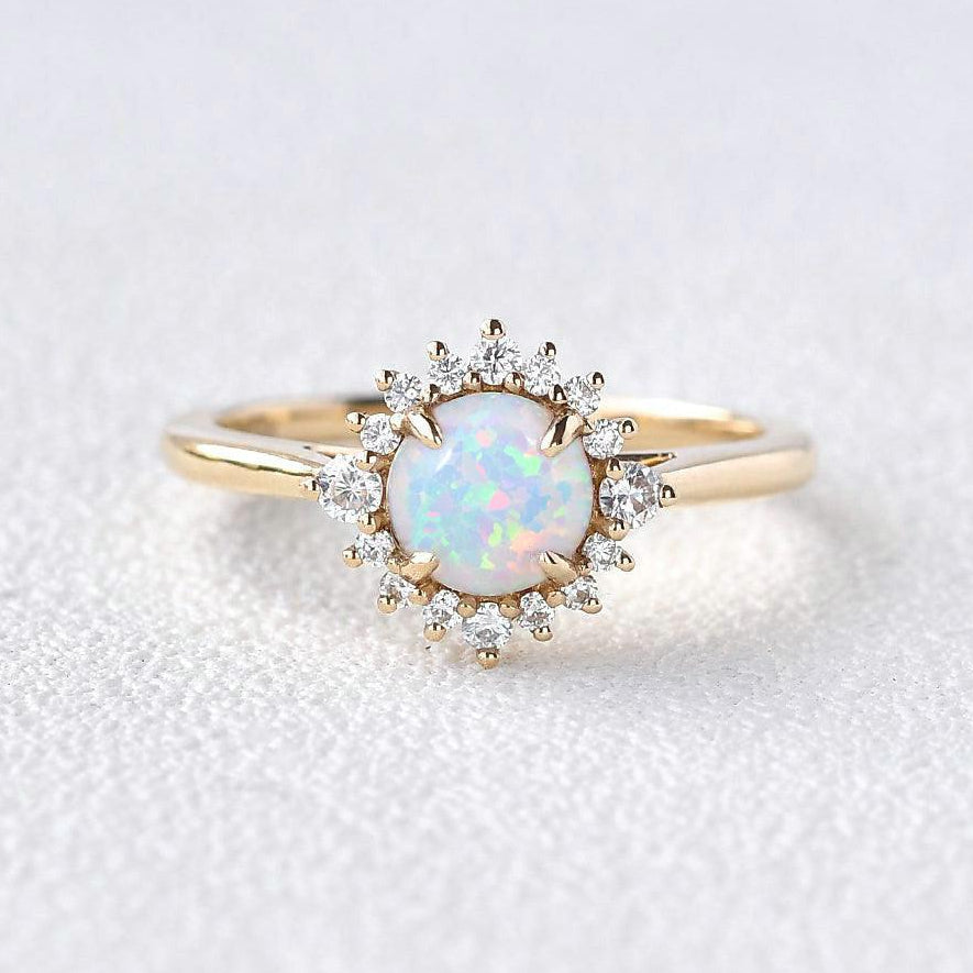 Valencia’s Sunburst | Round Opal & Moissanite Halo Ring