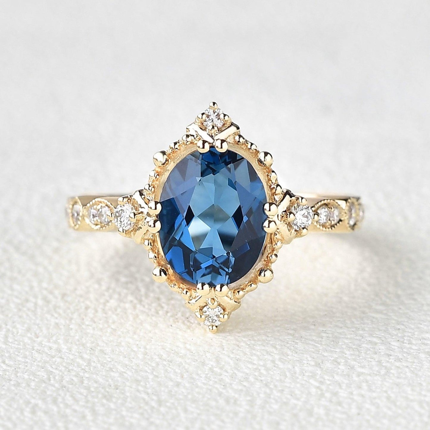 Aurelia’s Luminara | 1.5CT Oval London Blue Topaz & Diamond Art Deco Ring