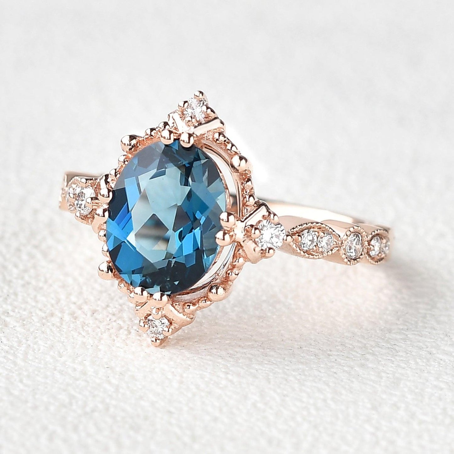 Aurelia’s Luminara | 1.5CT Oval London Blue Topaz & Diamond Art Deco Ring