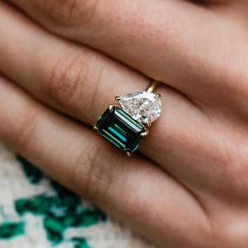 Regal Emerald Cut 2.5ct & Pear Cut 1.8ct Engagement Ring In Sterling Silver
