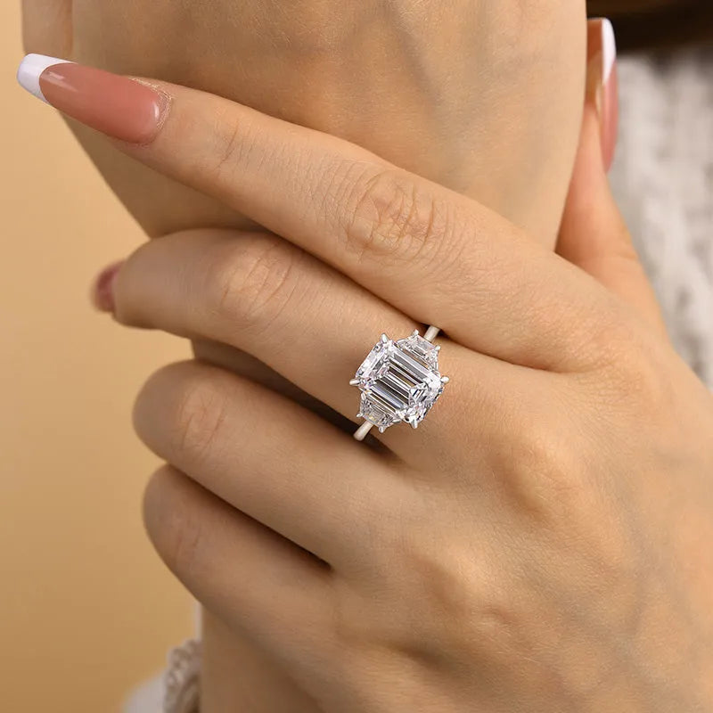 Lavish Emerald Cut 4.0ct Three Stone Engagement Ring In Sterling Silver