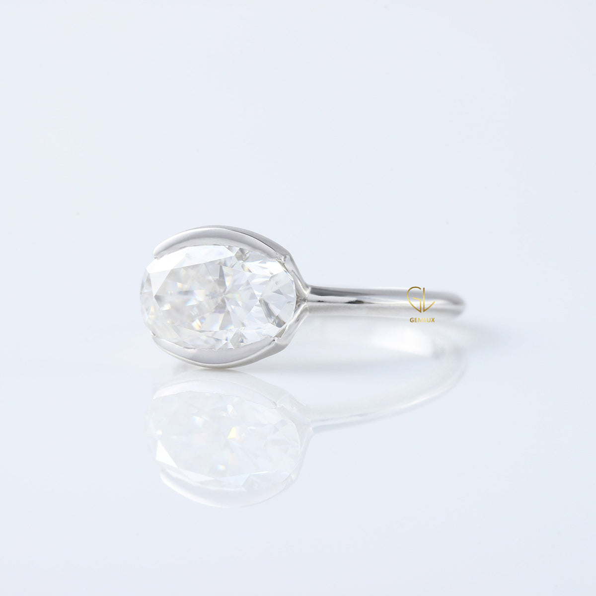 East West Oval Lab Grown Diamond Solitaire Ring - Half Bezel