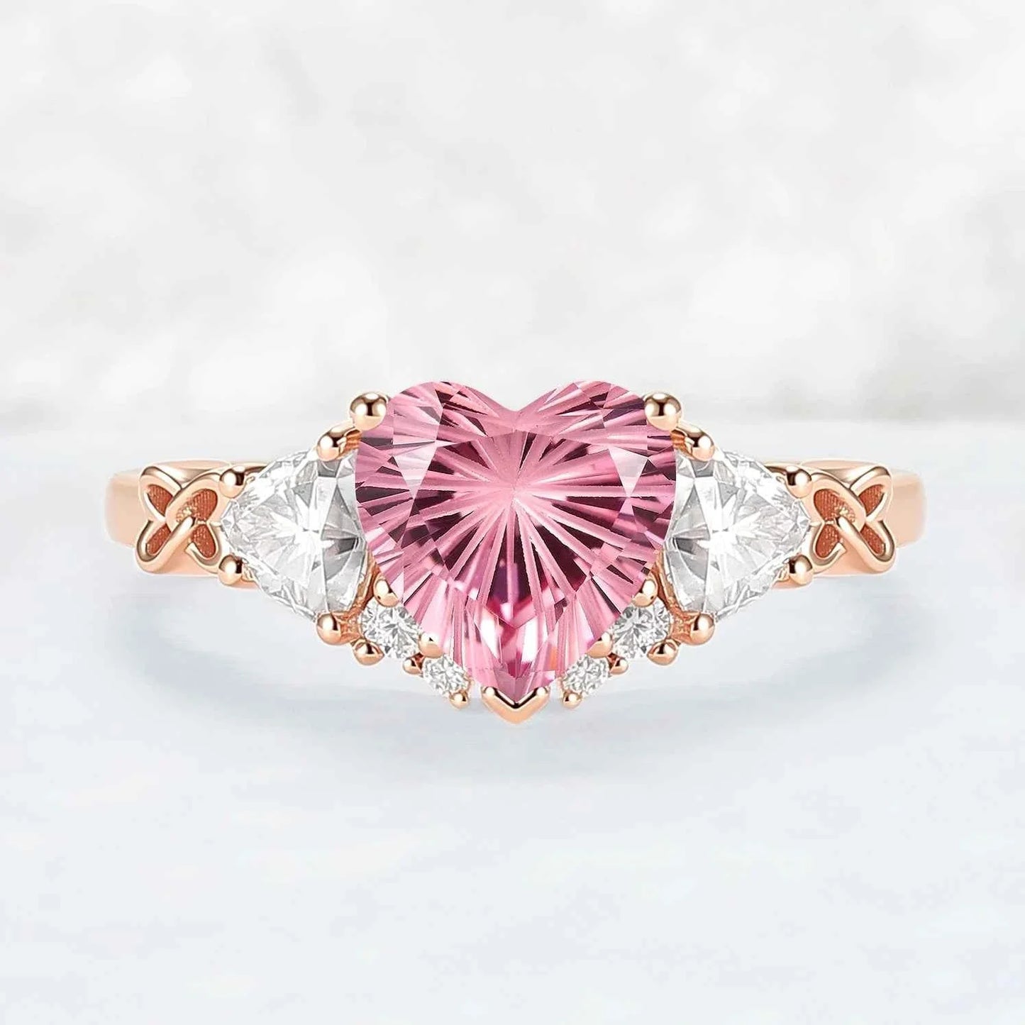 Eternal Knot Heart-Shaped Pink Sapphire Ring