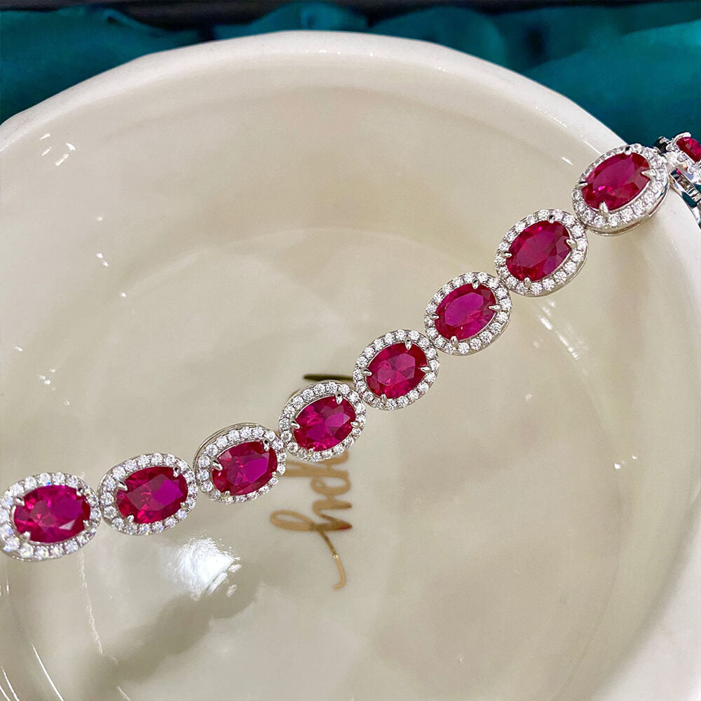 Eternity Halo Oval Ruby Sterling Silver Bracelet