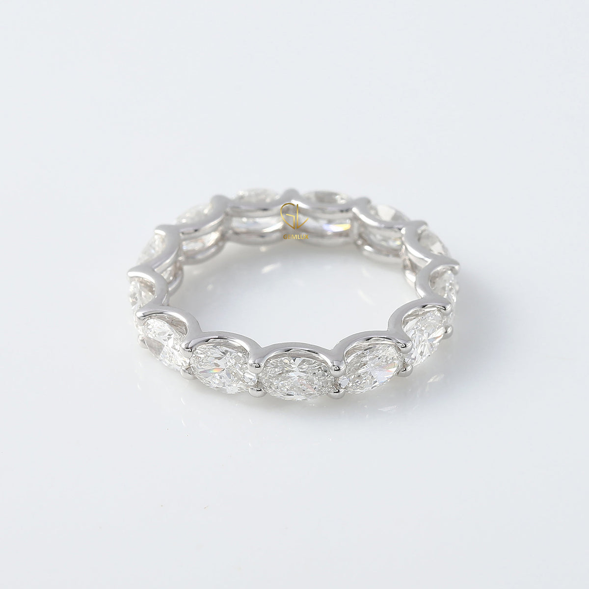 East to West Oval Cut Moissanite Eternity Wedding Band