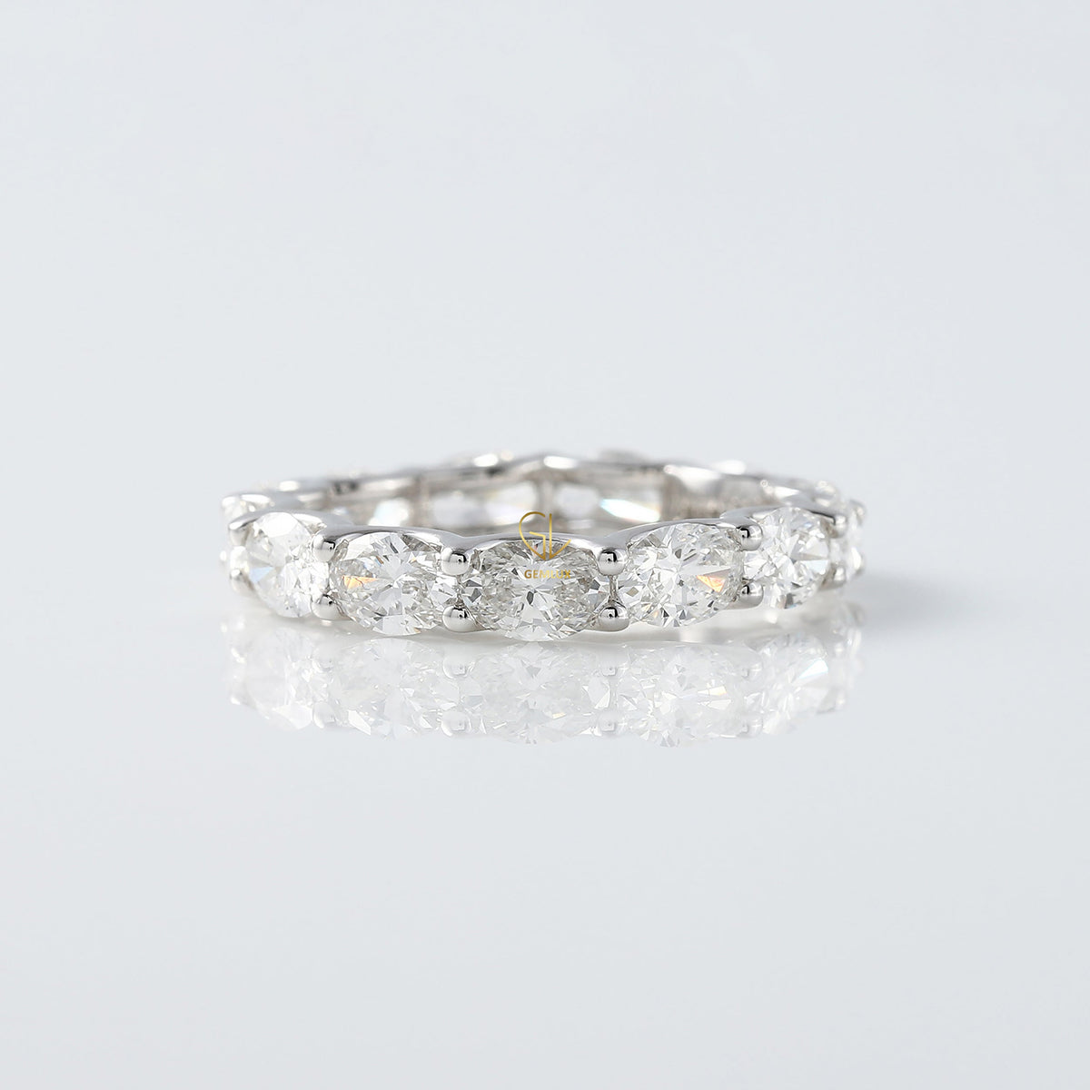 East to West Oval Cut Moissanite Eternity Wedding Band
