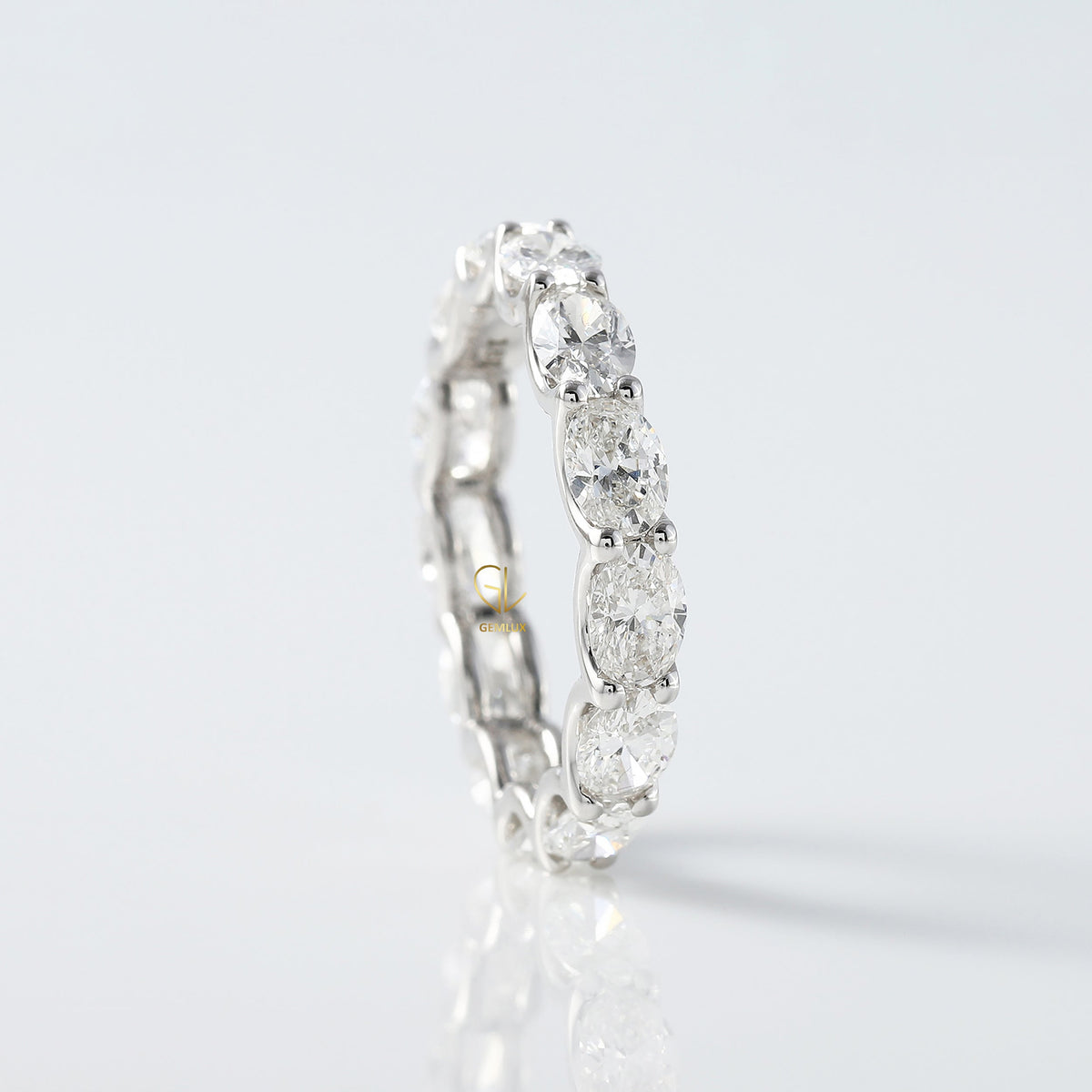 East to West Oval Cut Moissanite Eternity Wedding Band