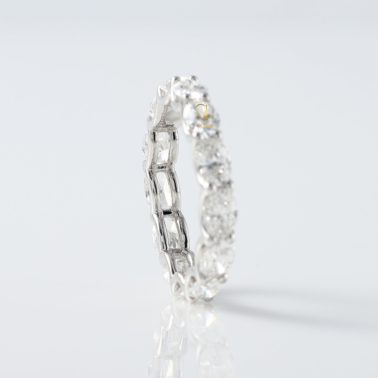East to West Oval Cut Moissanite Eternity Wedding Band
