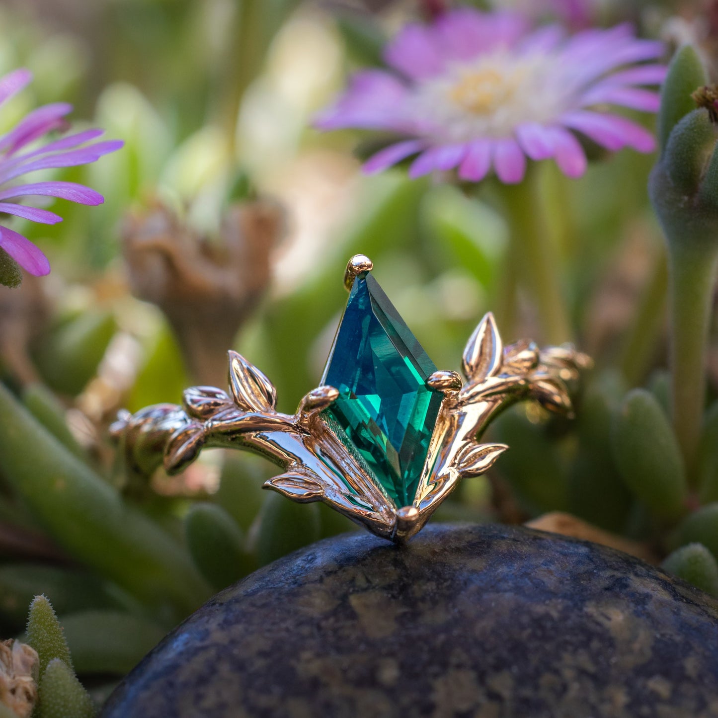 "Fae" - Solitaire Lozenge Cut Lab-Grown Emerald Engagement Ring On A Branch-Style Band
