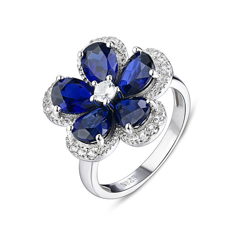 Five Petal Halo Pear Sapphire Flower Ring In Sterling Silver