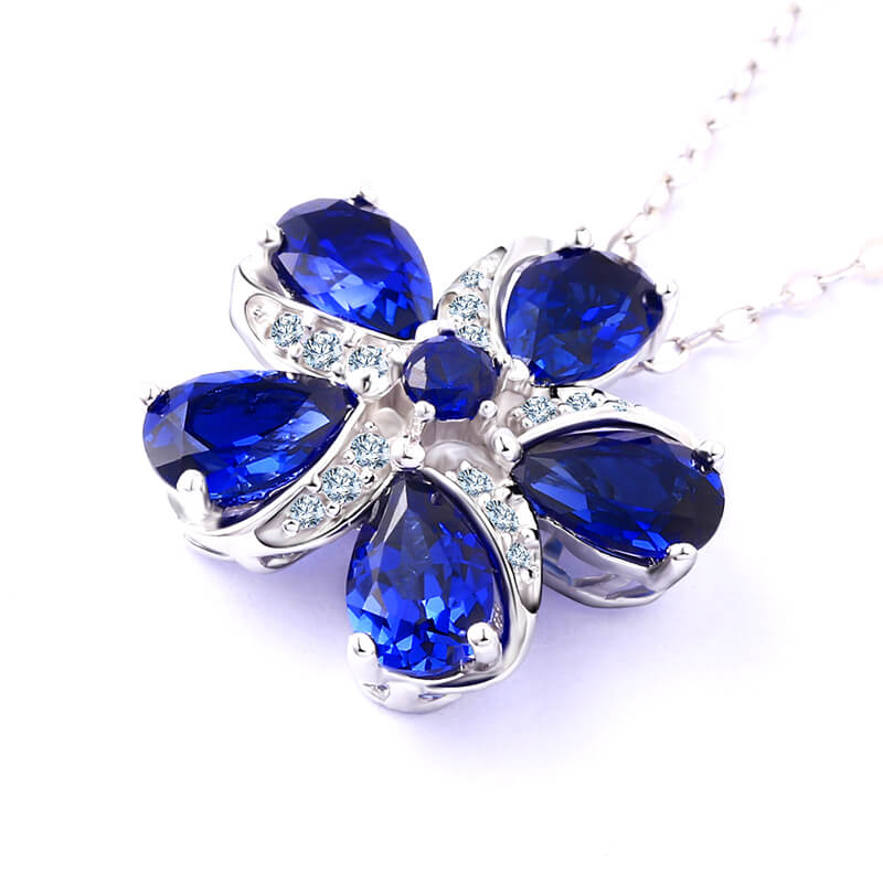 Five Petal Sapphire Flower Necklace In Sterling Silver