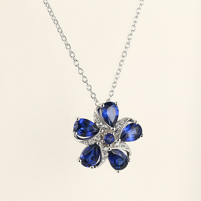 Five Petal Sapphire Flower Necklace In Sterling Silver