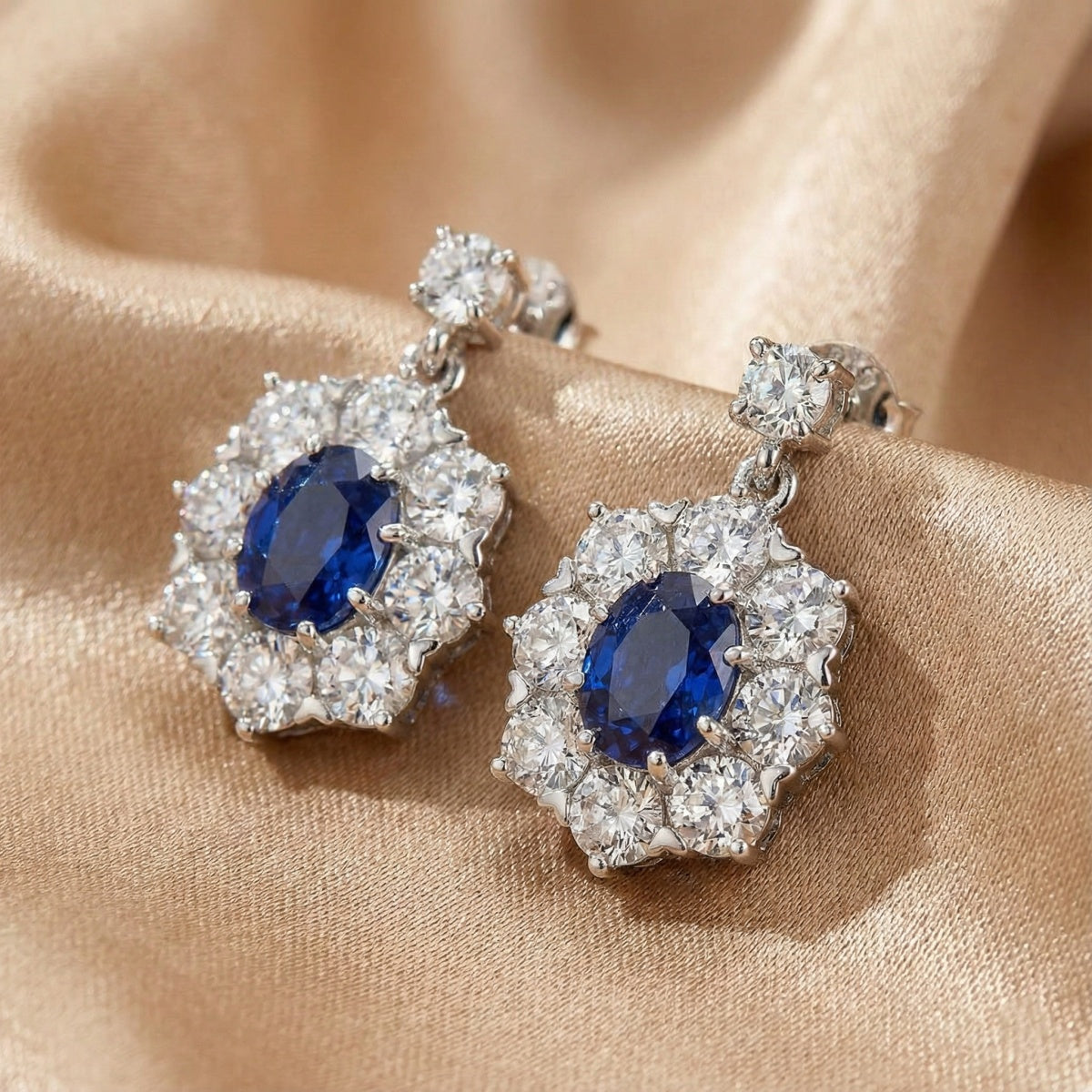Solarii Oval Cut Blue Stone Halo Drop Earrings in Sterling Silver